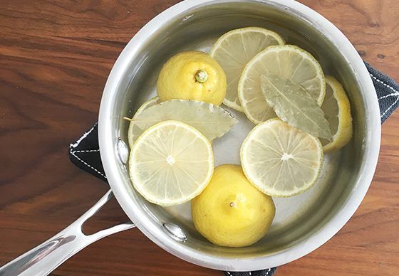 lemons in pan of water to make aromatherapy